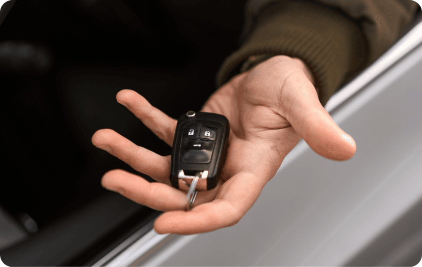 Someone holding the car keys