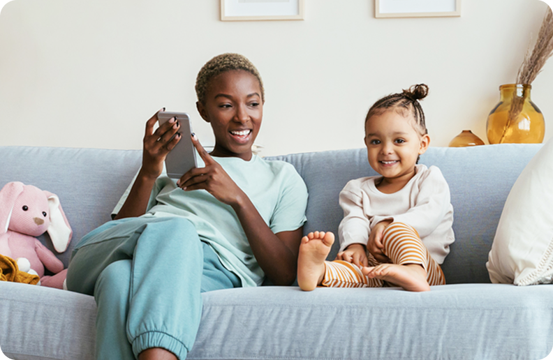 A women and her child on the sofa