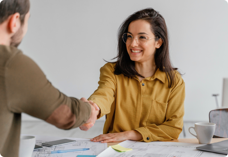 Woman's shaking a hand