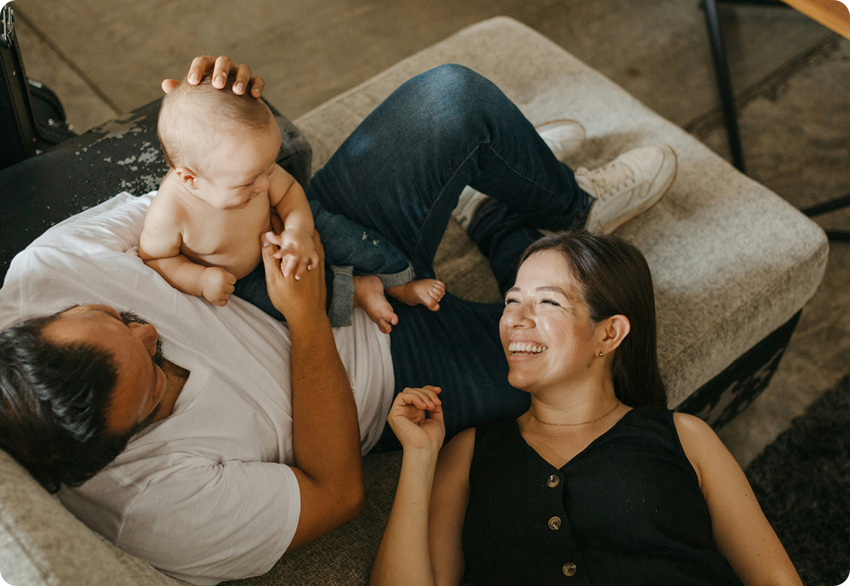 family lying on the couch