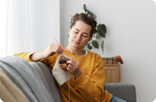 Photo of a woman knitting