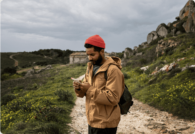 Spanish visa applicant looking at his phone