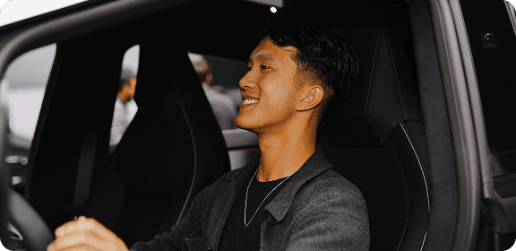 A man driving a car.