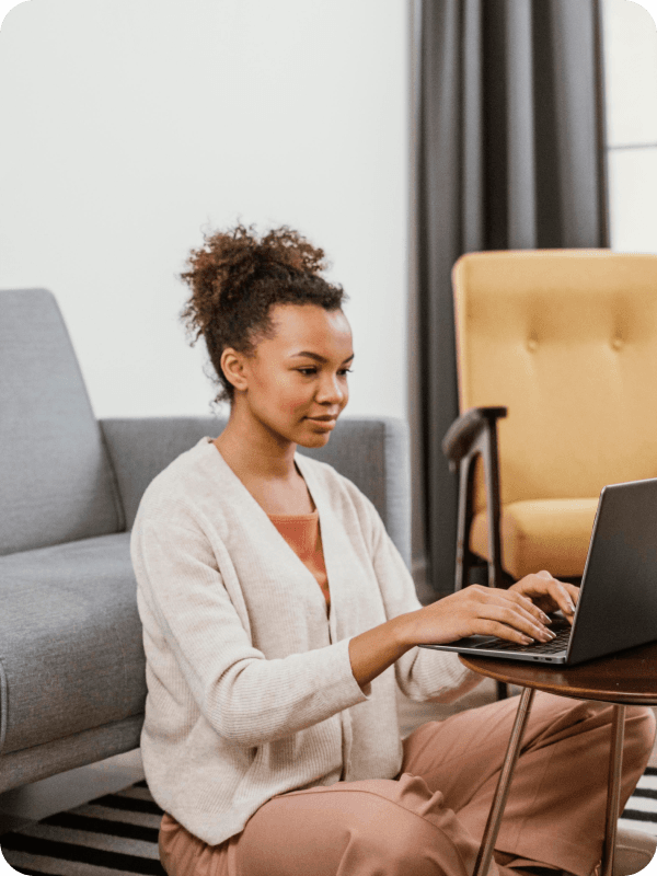 Woman working on her laptop.