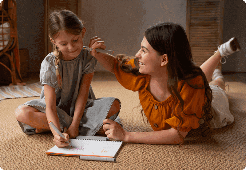 Au pair on a Spanish visa playing with child