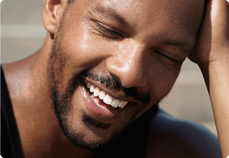 Spaniard with a dental bridge smiling
