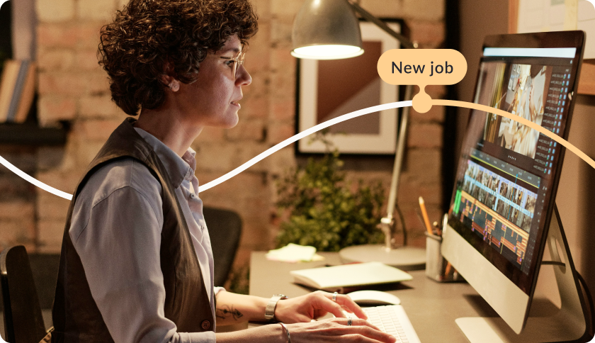 Woman working in front of a computer. The tag reads "New job".