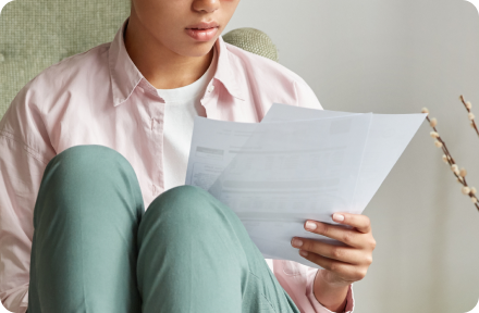 Woman reading traffic fine