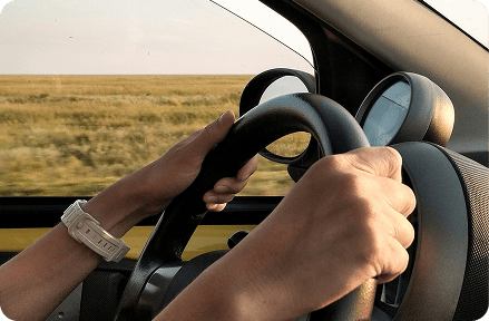 A person driving a car in Portugal.