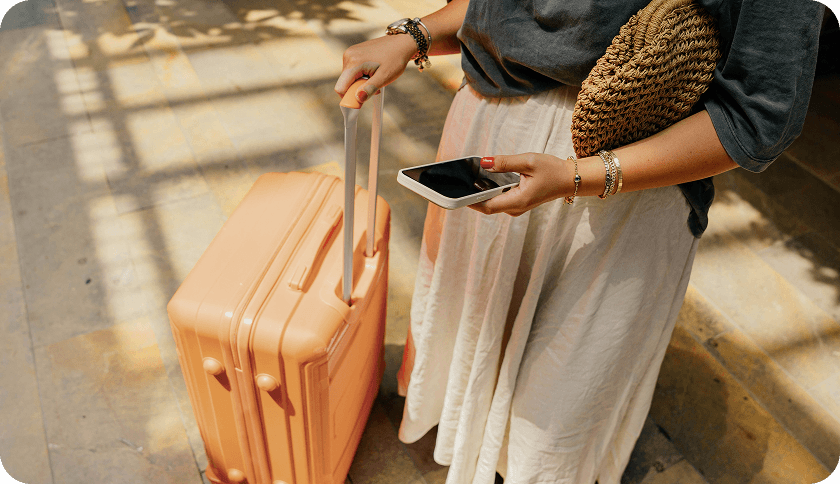 Person with suitcase in Italy