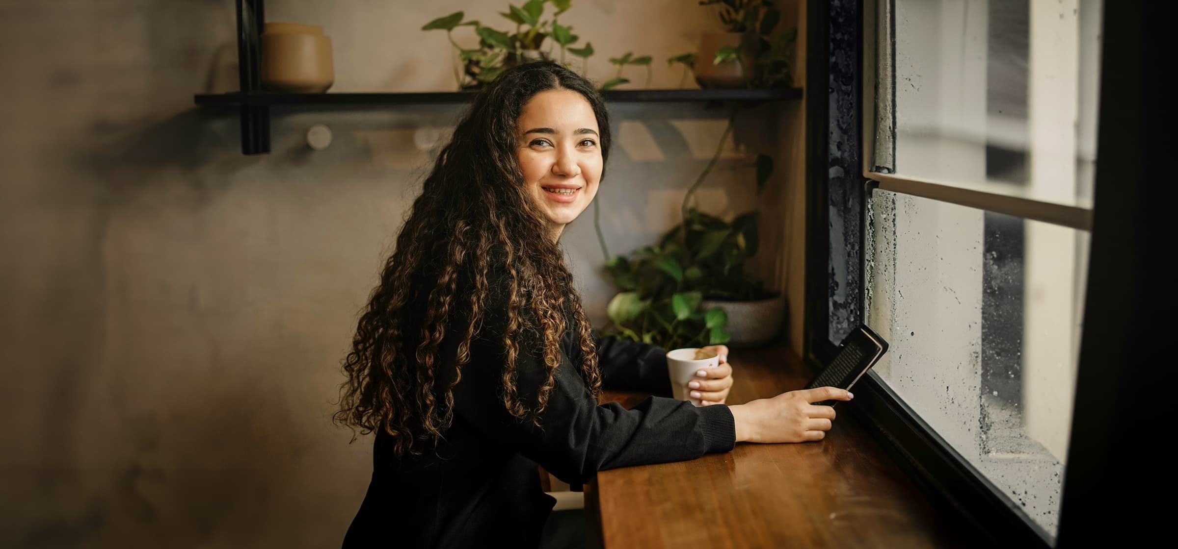 A student studying at a cafe.
