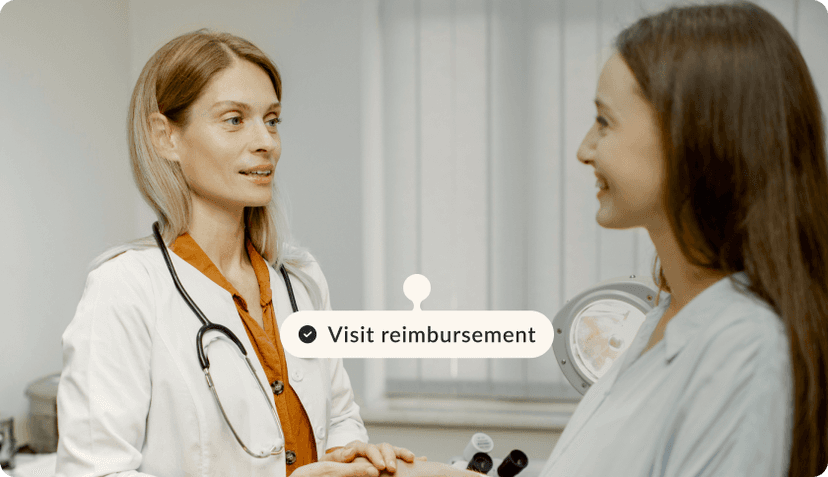 A doctor talking to her patient at a private hospital in Portugal.