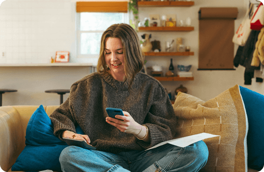 A female user submitting a claim on Feather's mobile app