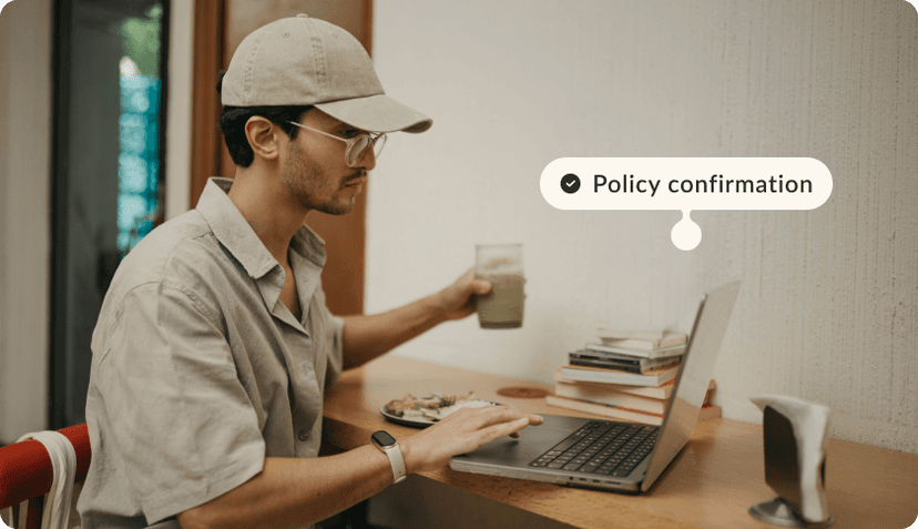 An expat in Portugal buying an insurance policy on his laptop.