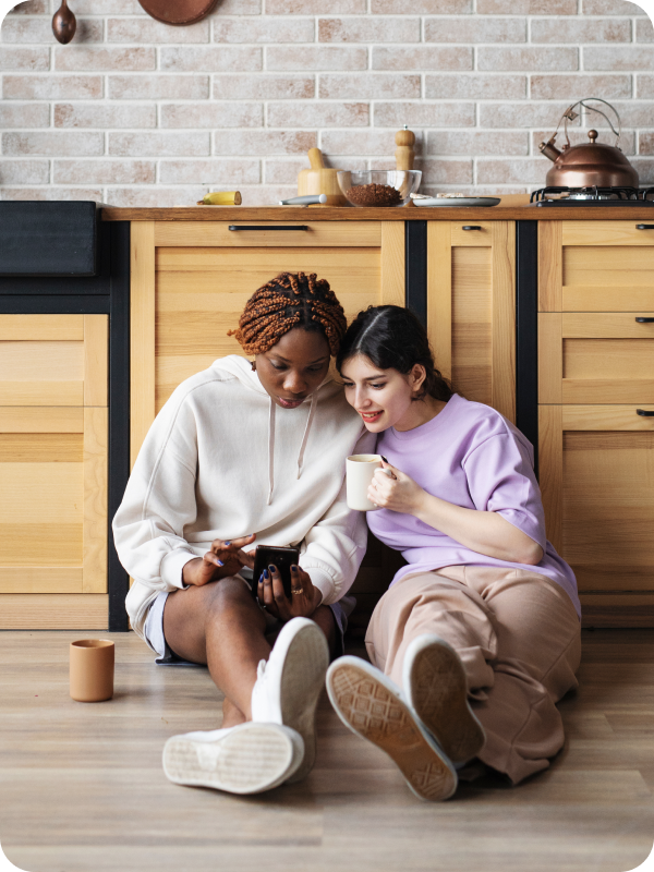 Couple checking their household insurance on the phone
