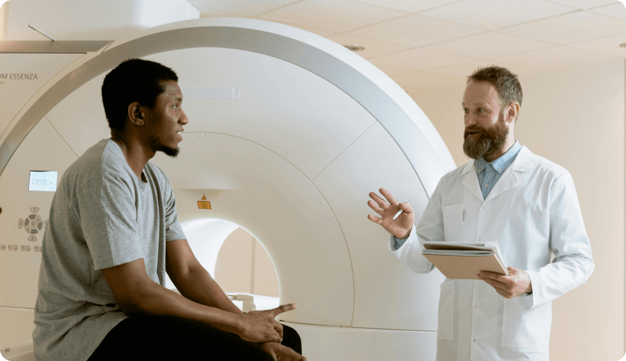 Doctor explaining something to patient.